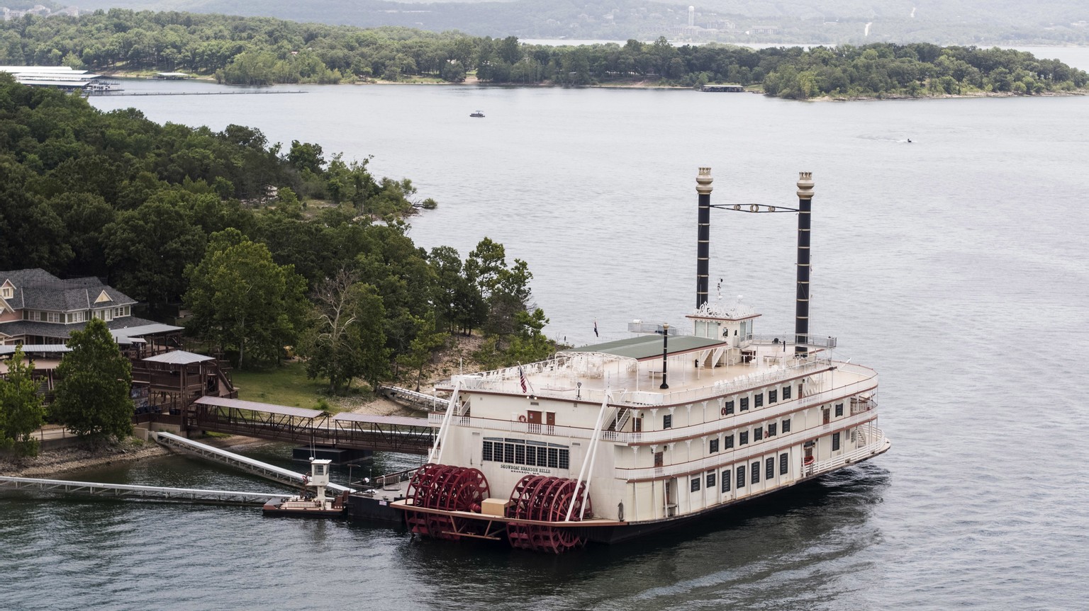 This photo shows a Showboat Branson Belle riverboat docked on Table Rock Lake near Branson, Mo., Friday, July 20, 2018, a day after a duck boat capsized and sank in the lake. Stone County Sheriff Doug ...