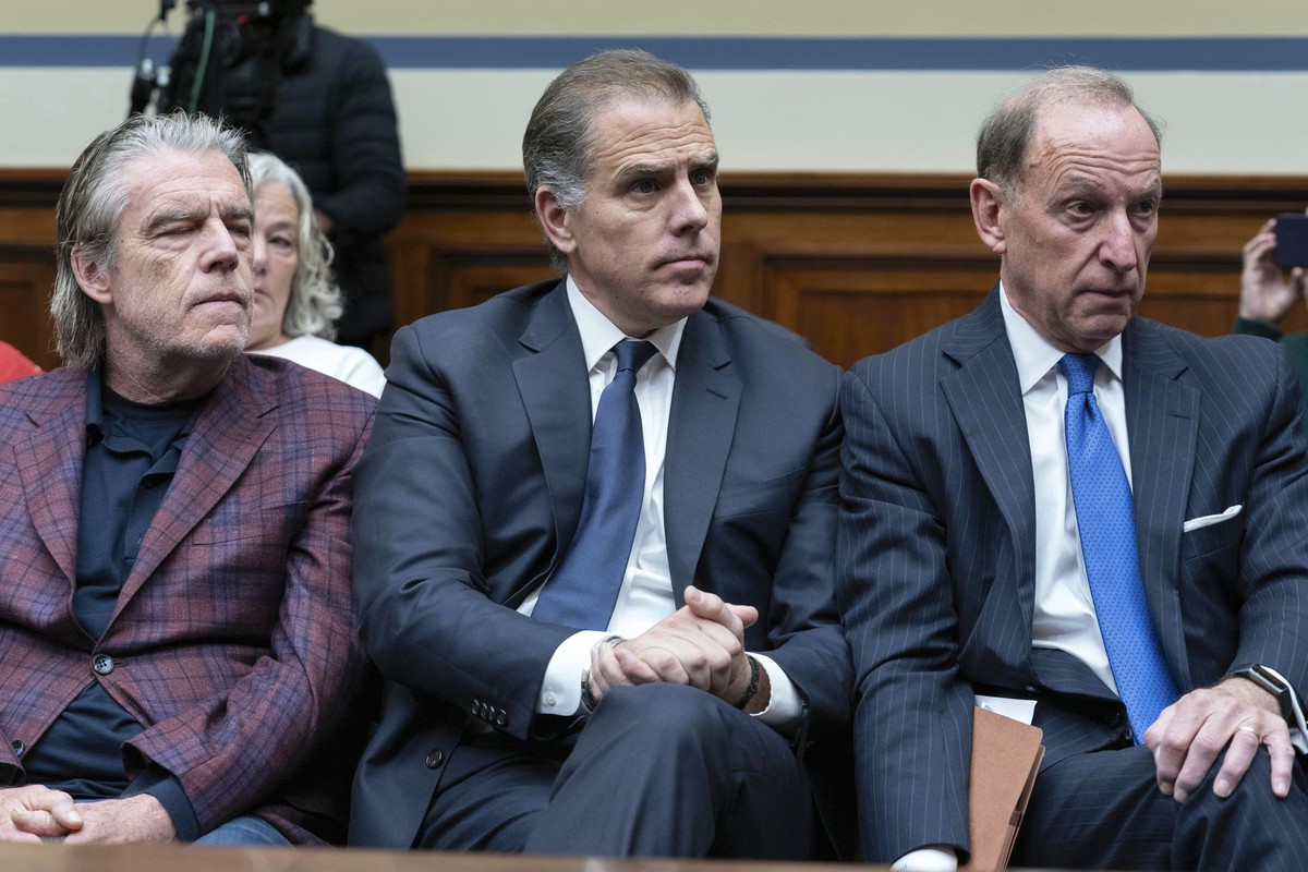 Hunter Biden, President Joe Biden's son, center, accompanied by his attorney Abbe Lowell, right, sit in the front row at a House Oversight Committee hearing as Republicans are taking the first st ...