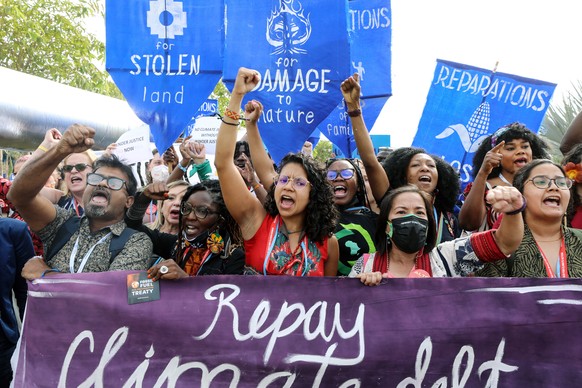 epa10310245 Climate activists protest demanding climate justice during the COP27 UN Climate Summit in Sharm El-Sheikh, Egypt, 17 November 2022. The 2022 United Nations Climate Change Conference (COP27 ...