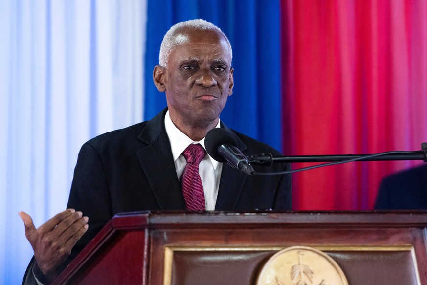 epa11310818 Former president of the Senate Edgard Leblanc Fils speaks after his designation as new president of the Transition Council in the office of the Prime Minister in the Village d&#039;Accueil ...