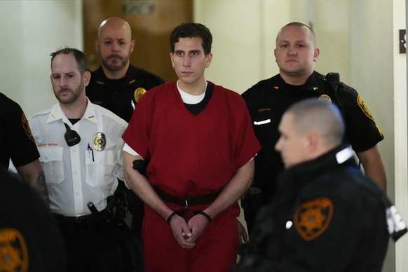 Bryan Kohberger, who is accused of killing four University of Idaho students, is escorted to an extradition hearing at the Monroe County Courthouse in Stroudsburg, Pa., Tuesday, Jan. 3, 2023. (AP Phot ...