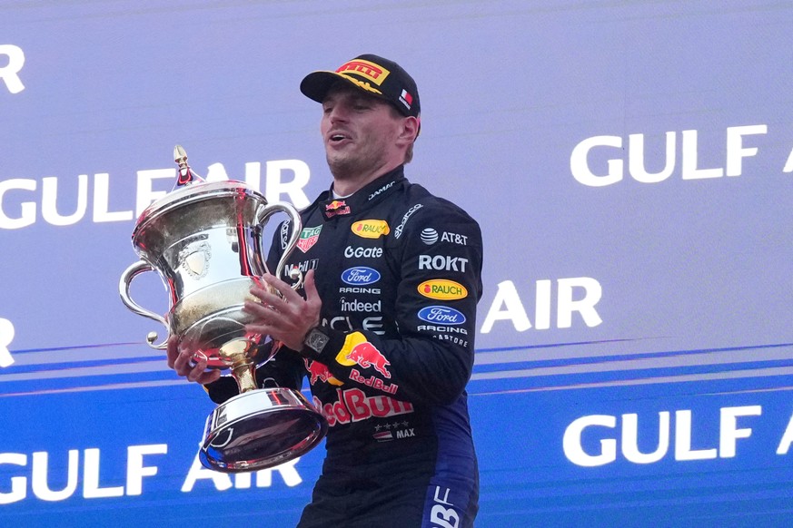 Red Bull driver Max Verstappen of the Netherlands celebrates on the podium after winning the Bahrain Grand Prix in Sepang, Malaysia, Sunday, Oct. 4, 2026. (AP Photo/Aijaz Rahi)
Max Verstappen