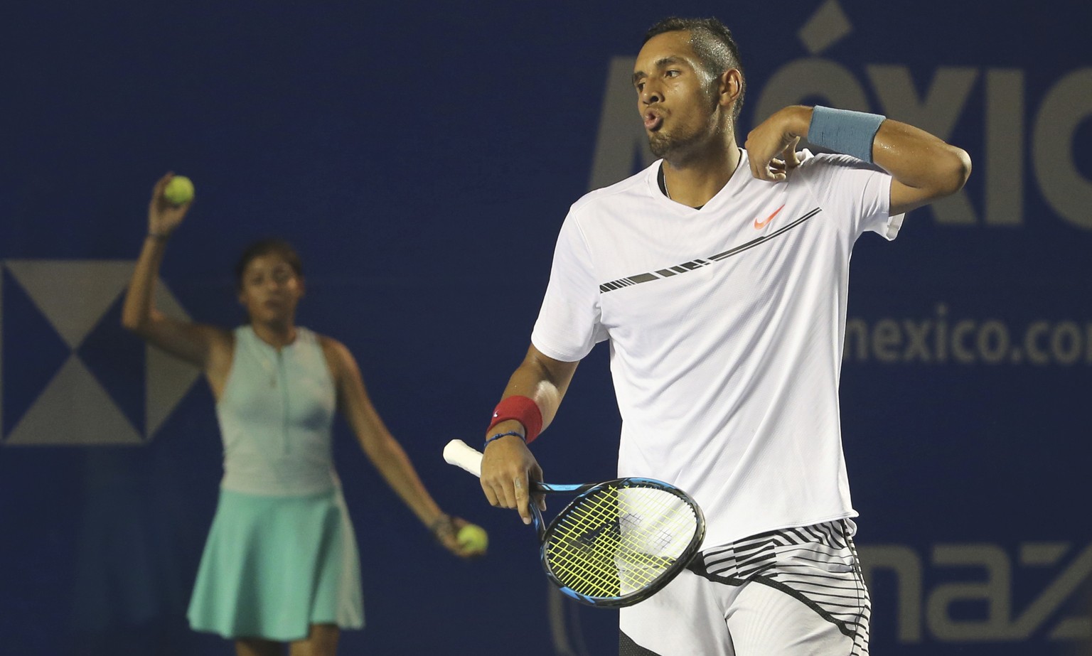 Australia&#039;s Nick Kyrgios reacts after winning a point against Serbia&#039;s Novak Djokovic during a quarterfinal match of the Mexican Tennis Open in Acapulco, Mexico, Thursday March 2, 2017. Kyrg ...