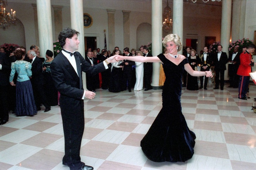 November 9, 1985 - Washington, District of Columbia, United States of America - In this photo provided by the Ronald Reagan Presidential Library, Princess Diana dances with John Travolta in the Cross  ...