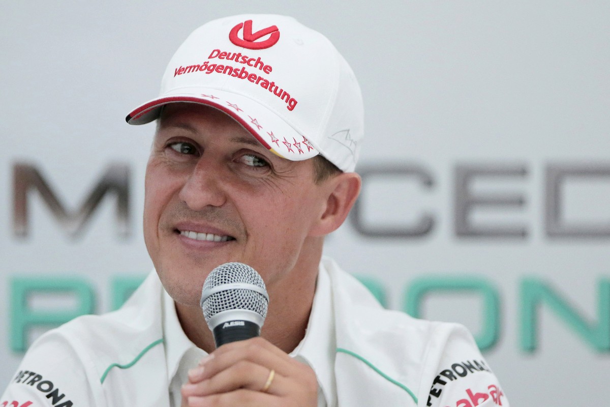 FILE - Michael Schumacher announces his retirement from Formula One during a press conference at the Suzuka Circuit venue for the Japanese Formula One Grand Prix in Suzuka, Japan, Oct. 4, 2012. German ...