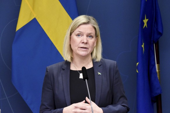 epa09677107 Swedish Prime Minister Magdalena Andersson presents a series of new COVID-19 restrictions during a press conference in Stockholm, Sweden, 10 January 2022. The new rulesÂ will come into for ...