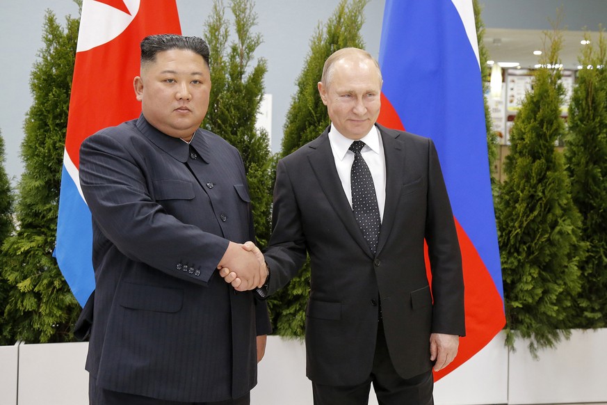 FILE - Russian President Vladimir Putin, right, and North Korea&#039;s leader Kim Jong Un shake hands during their meeting in Vladivostok, Russia, April 25, 2019. As North Korea conducts more powerful ...