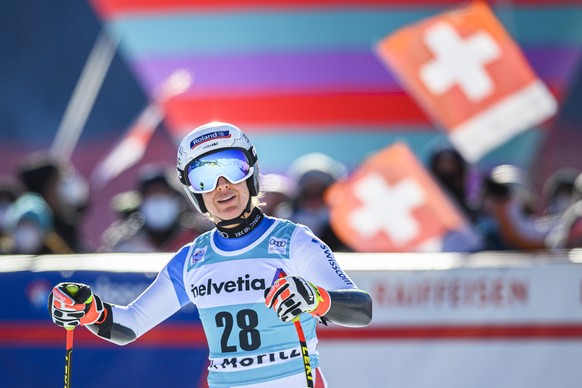 Jasmine Flury of Switzerland reacts in the finish area during the women&#039;s Super-G race at the FIS Alpine Ski World Cup, in St. Moritz, Switzerland, Sunday, December 12, 2021. (KEYSTONE/Peter Schn ...
