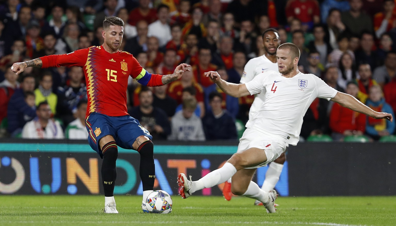 England&#039;s Eric Dier, right, stops Spain&#039;s Sergio Ramos during the UEFA Nations League soccer match between Spain and England at Benito Villamarin stadium, in Seville, Spain, Monday, Oct. 15, ...