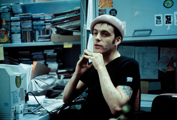 Richey Edwards of the Manic Street Preachers is interviewed at the offices of the NME, London, 1992. (Photo by Martyn Goodacre/Getty Images)