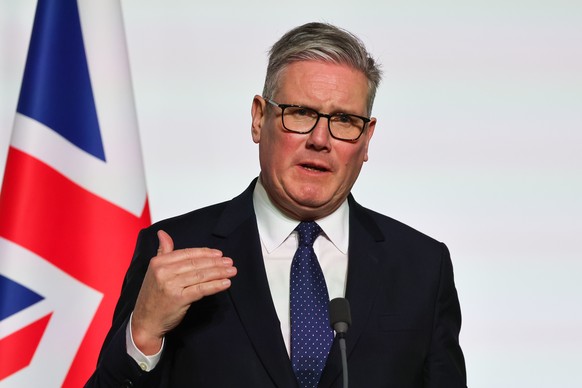 Britain's Prime Minister Keir Starmer delivers a speech after the signing of the declaration on deploying post-ceasefire force in Ukraine during the 'Coalition of the Willing' summit on ...