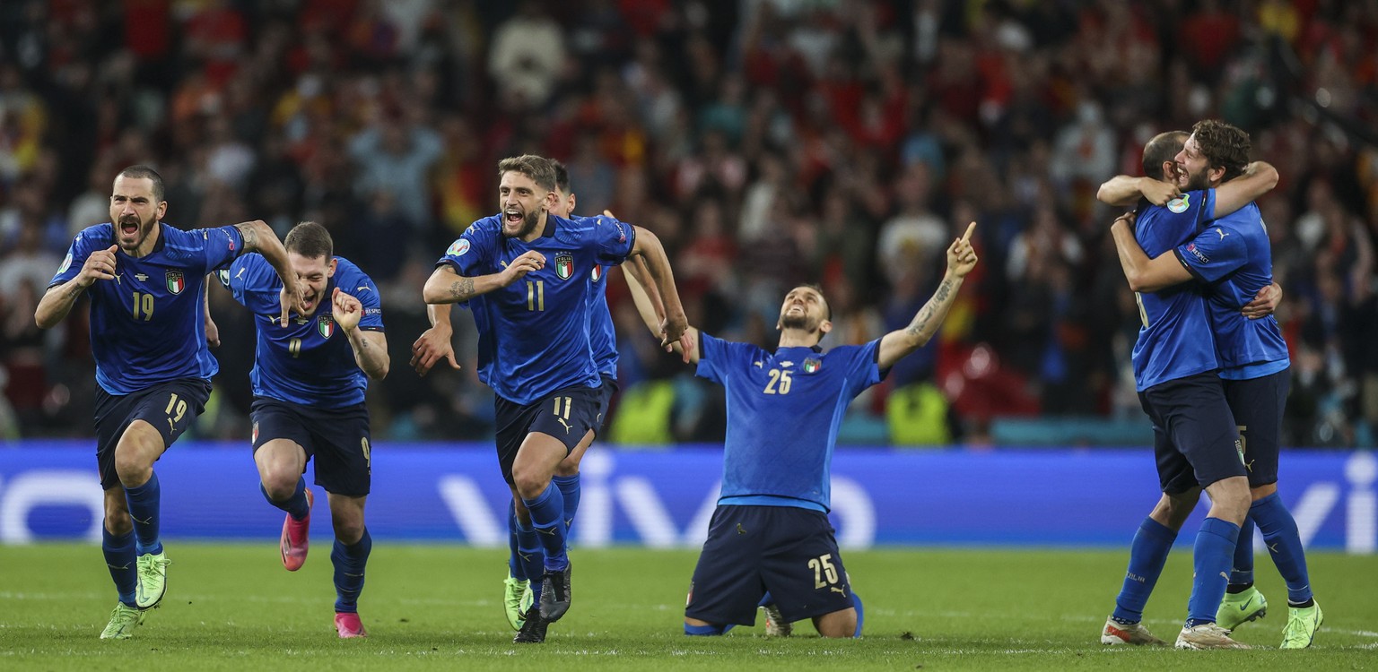 Italy players celebrate after winning the Euro 2020 soccer championship semifinal match against Spain at Wembley stadium in London, England, Tuesday, July 6, 2021. (Carl Recine/Pool Photo via AP)