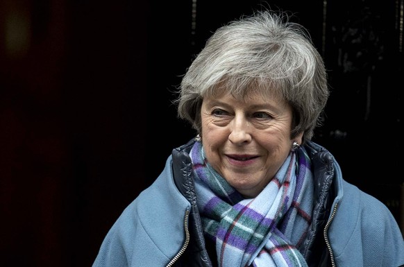 epa07329497 British Prime Minister Theresa May leaves 10 Downing Street to attend the House of Commons, London, Britain, 29 January 2019. The House of Commons is set to vote on amendments to British P ...