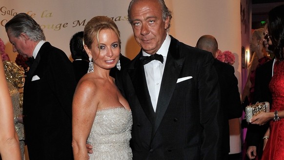 epa02856625 Founder of Swiss fine watch and jewelry firm De Grisogono, Fawaz Gruosi (R) and an unidentified guest arrive for the 63rd Red Cross Ball at the Sporting Club Salle des Etoiles in Monaco, 0 ...