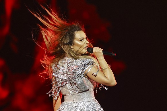 epa09216314 Anxhela Peristeri from Albania with the song &#039;Karma&#039; performs during the Second Semi-Final of the 65th annual Eurovision Song Contest (ESC) at the Rotterdam Ahoy arena, in Rotter ...