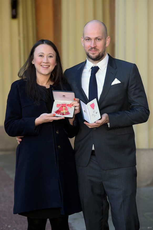 29/11/2016. London, United Kingdom. investiture at Buckingham Palace. Buckingham Palace. James Watt, Co-Founder, BrewDog receives an MBE for services to the Brewing Industry, with his wife Johanna Bas ...