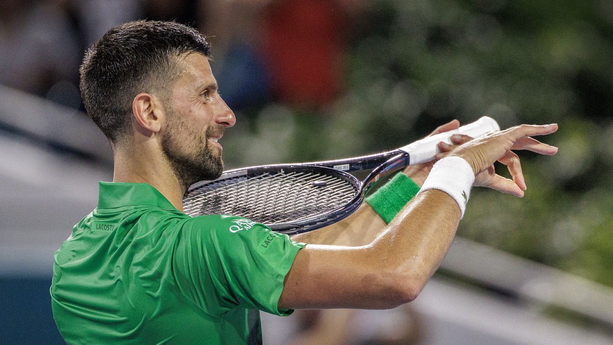 epa11988635 Novak Djokovic of Serbia celebrates his victory against Lorenzo Musetti of Italy during their Men's Singles 4th Round at the 2025 Miami Open tennis tournament at the Hard Rock Stadium ...
