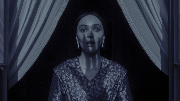 This image released by Focus Features shows Lily-Rose Depp in a scene from &quot;Nosferatu.&quot; (Focus Features via AP)