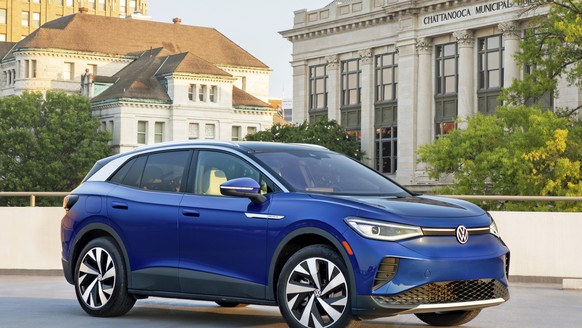 This photo provided by Volkswagen shows the 2021 ID.4. It boasts up to 260 miles of EPA-estimated range, and Edmunds found it can go even farther in real-world driving. (Daniel Byrne Photography/Court ...