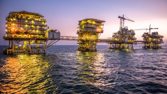 epa08046264 An undated handout photo, made available by Saudi Arabian oil company Saudi Aramco on December 5, 2019, showing Saudi Aramco's Tanajib facility, Saudi Arabia.  Tanajib is an oil complex located...