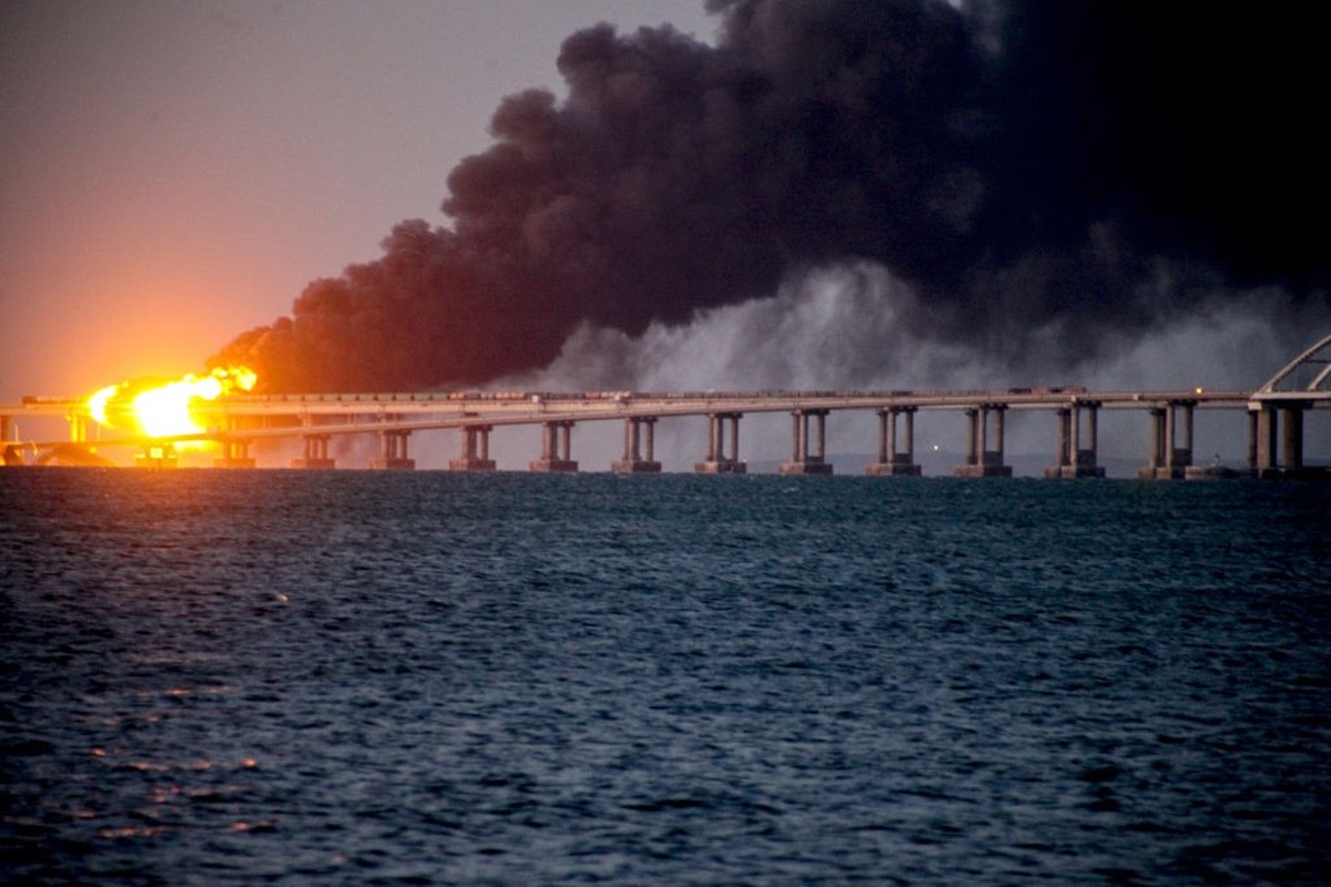 CRIMEA - OCTOBER 08: Explosion causes fire at the Kerch bridge in the Kerch Strait, Crimea on October 08, 2022. A fire broke out early Saturday morning on the Kerch Bridge -- preceded by an explosion  ...