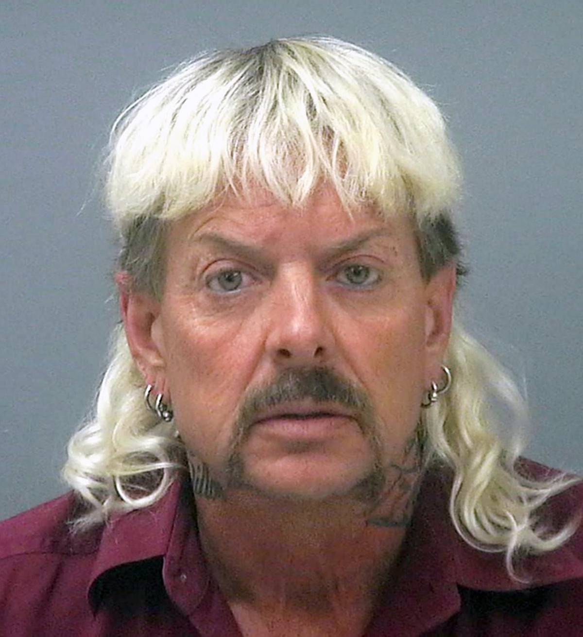 FILE - This undated file photo provided by the Santa Rose County Jail in Milton, Fla., shows Joseph Maldonado-Passage, also known as Joe Exotic. The man known as the "Tiger King" who gained  ...