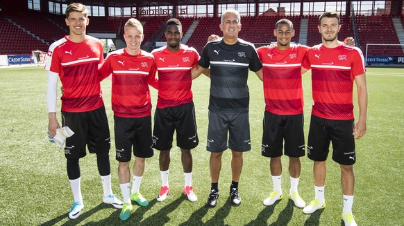 From left to right, Swiss goalkeeper Gregor Kobel, Swiss defender Florent Hadergjonaj, Swiss defender Ulisses Garcia, Swiss midfielder Djibril Sow, Swiss defender Anto Grgic, pose with Swiss head coac ...