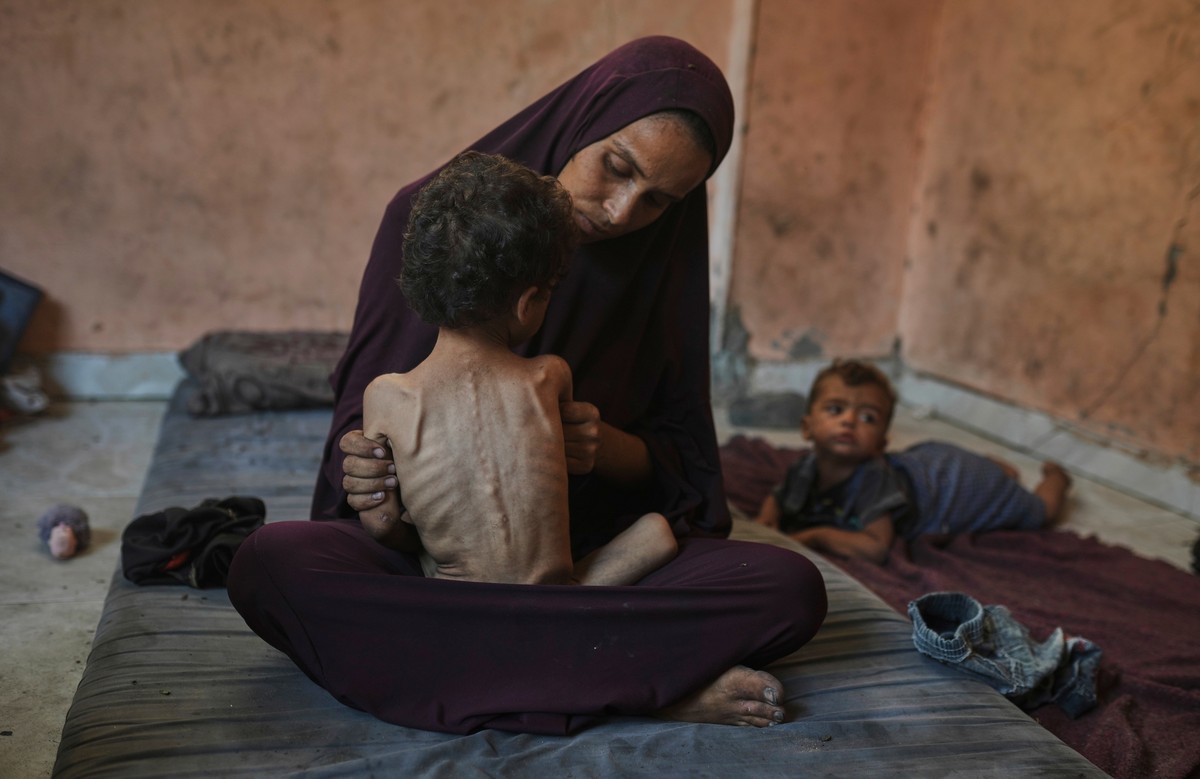 Naima Abu Ful poses for a photo with her 2-year-old malnourished child, Yazan, at their home in the Shati refugee camp in Gaza City, Wednesday, July 23, 2025. (AP Photo/Jehad Alshrafi)
APTOPIX Mideast ...