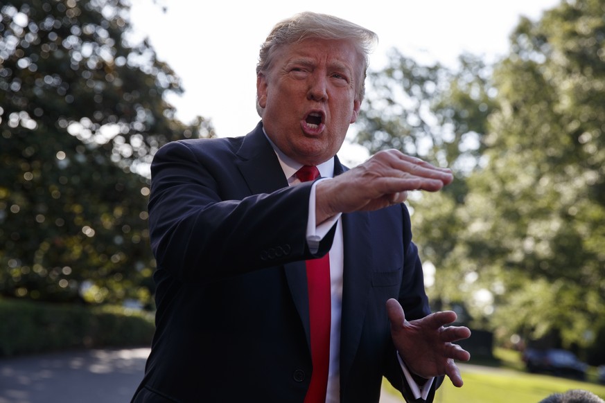 In this May 30, 2019, photo, President Donald Trump talks with reporters on the South Lawn of the White House in Washington. (AP Photo/Evan Vucci)