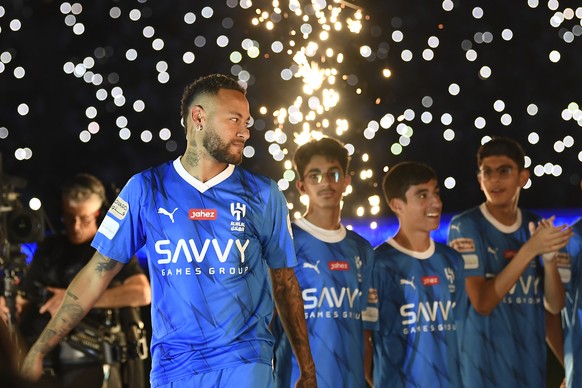 Brazilian national team&#039;s historical top scorer and the star of Paris Saint-Germain, Neymar Jr. is greeted as he attends the official unveiling as a new member of Saudi Al Hilal club at King Fahd ...