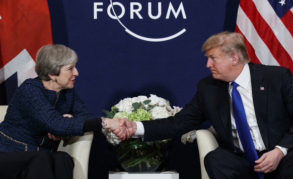 President Donald Trump meets with British Prime Minister Theresa May at the World Economic Forum, Thursday, Jan. 25, 2018, in Davos, Switzerland. (AP Photo/Evan Vucci)