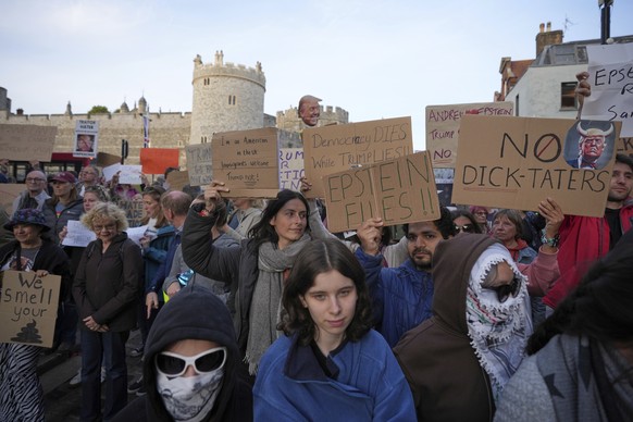 Protesters gather for a demonstration ahead of the arrival of President Donald Trump in Windsor, England, Tuesday, Sept. 16, 2025.(AP Photo/Kin Cheung)
Trump Britain