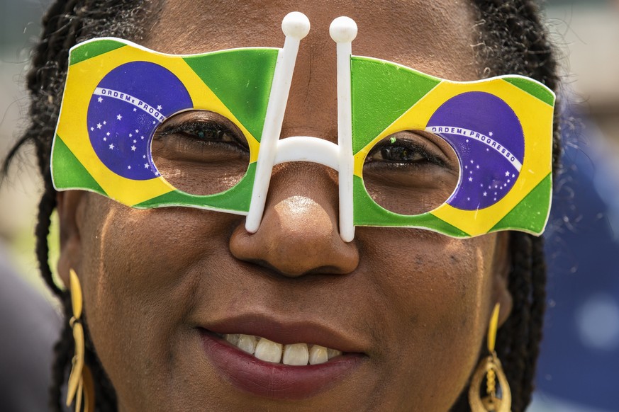 epa10307498 Supporters of the President of Brazil, Jair Bolsonaro, protest at the Army Headquarters in Brasilia, Brazil, 15 November 2022. Thousands of Bolsonaro supporters gathered in front of the ba ...