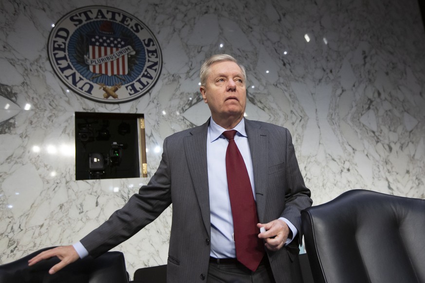 The new Senate Judiciary Committee Chairman Lindsey Graham, R-S.C., takes his seat at the start of the confirmation hearing for William Barr to be attorney general, on Capitol Hill in Washington, Tues ...