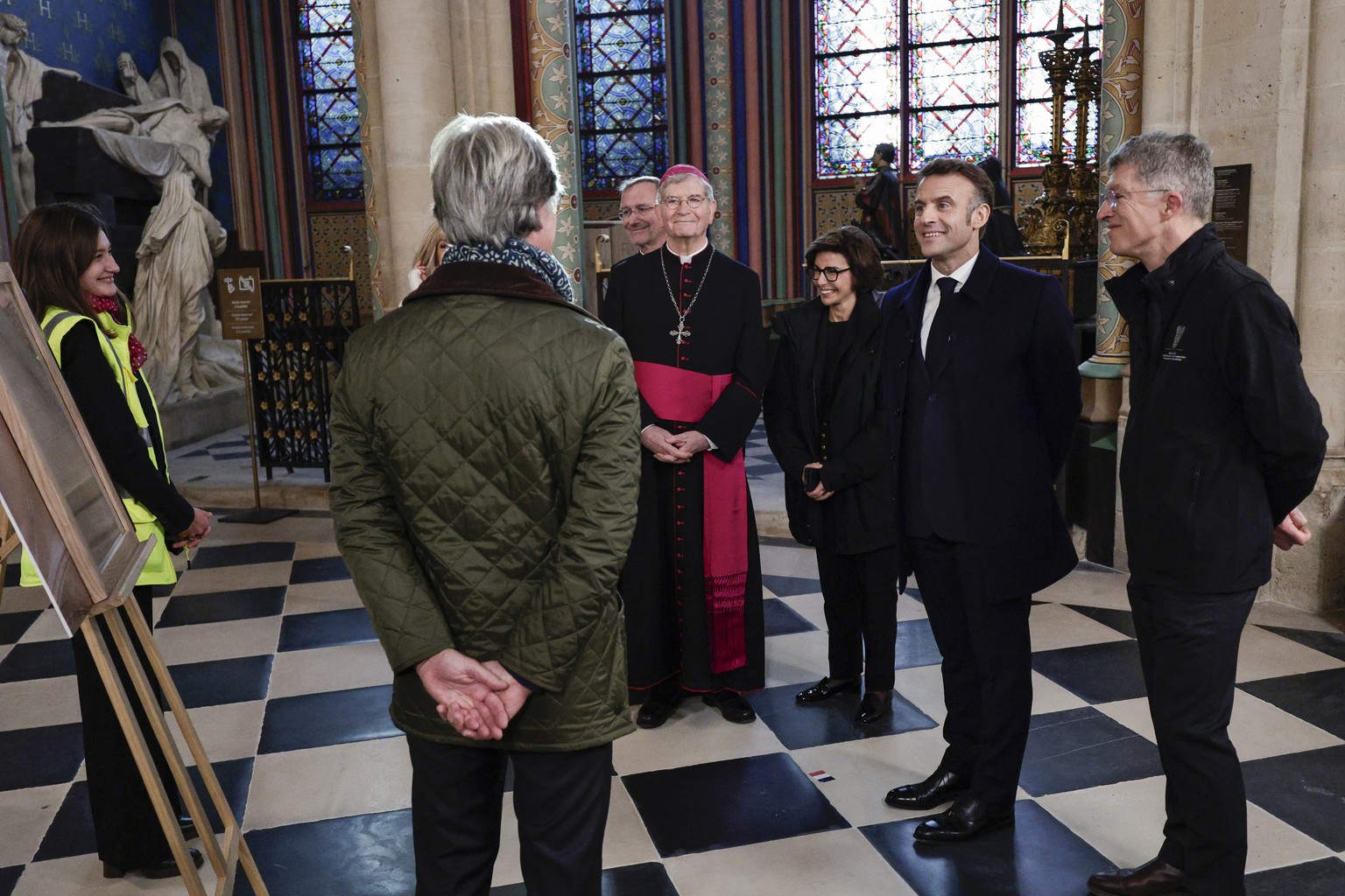 epa11747696 French President Emmanuel Macron (2R) during a visit of Notre-Dame de Paris cathedral in Paris, France, 29 November 2024. French President Macron is visiting the cathedral&#039;s construct ...