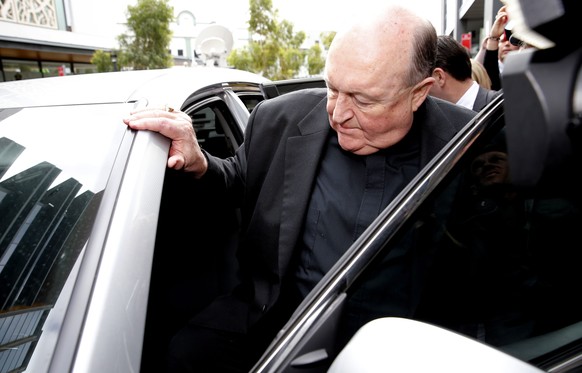 epa06919793 (FILE) - Archbishop Philip Wilson leaves after sentencing at Newcastle Local Court in Newcastle, Australia, 03 July 2018 (reissued 31 July 2018). According to reports, Archbishop Philip Wi ...