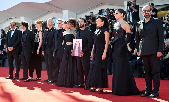epa12349133 (L-R) Guests, US actors and producers Rooney Mara and Joaquin Phoenix, Tunisian director Kaouther Ben Hania, Palestinian actor Motaz Malhees, Palestinian-Israeli actor Clara Khoury, Jordan ...