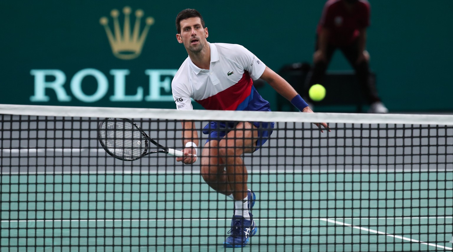 epa09570029 Novak Djokovic of Serbia in action during the final match against Daniil Medvedev of Russia at the Rolex Paris Masters tennis tournament in Paris, France, 07 November 2021. EPA/CHRISTOPHE  ...