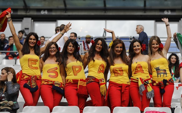 Spain&#039;s supporters sport shirts composing the Spanish word for Spain, prior to the Euro 2016 round of 16 soccer match between Italy and Spain, at the Stade de France, in Saint-Denis, north of Par ...