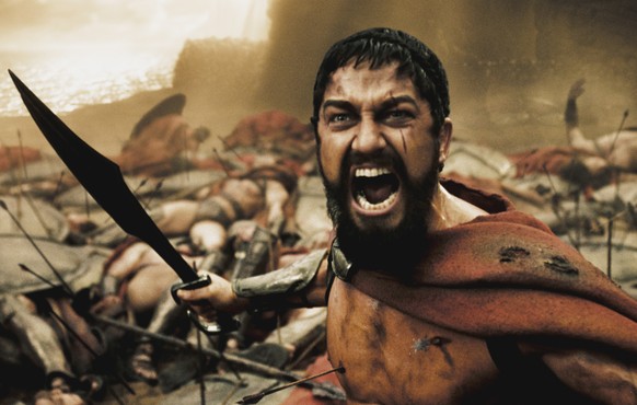 A wounded Leonidas (GERARD BUTLER) roars his defiance at the Persian invaders in Warner Bros. Pictures, Legendary Pictures and Virtual Studios action drama 300, distributed by Warner Bros. Pictur ...