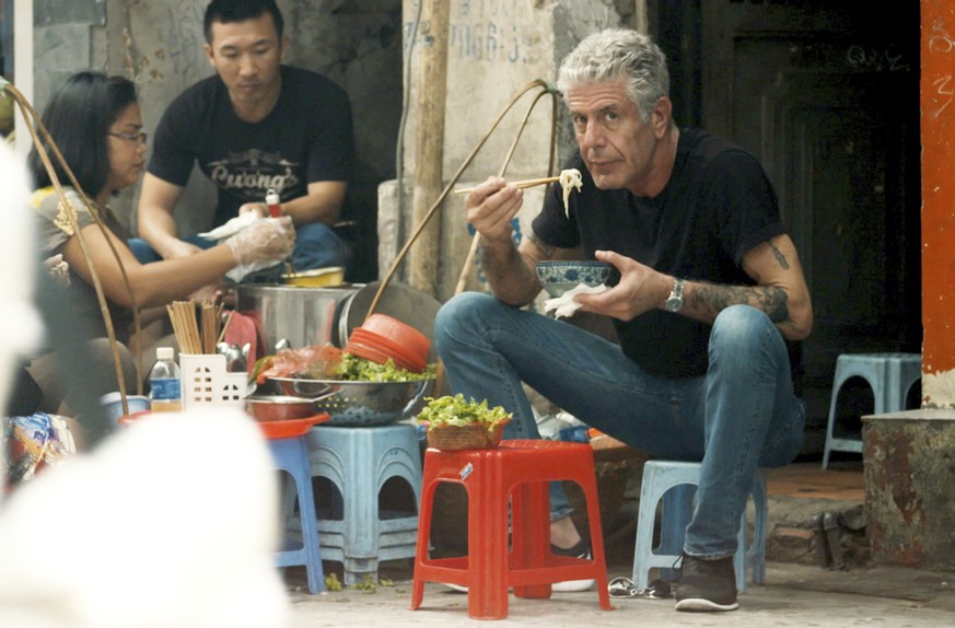 This image released by Focus Features shows Anthony Bourdain in Morgan Neville's documentary &quot;Roadrunner.&quot; (Focus Features via AP)