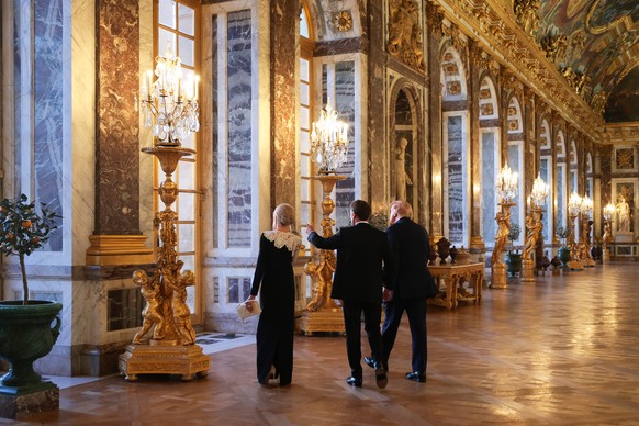 President Donald Trump receives a tour of Chateau de Versailles from President of France Emmanuel Macron and his wife Brigitte Macron ahead of a dinner Wednesday, June 17, 2026 in Versailles, France.  ...