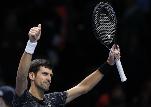FILE - In this Wednesday, Nov. 14, 2018, file photo, Novak Djokovic of Serbia celebrates after defeating Alexander Zverev of Germany in the ATP World Tour Finals men&#039;s singles tennis match at O2  ...