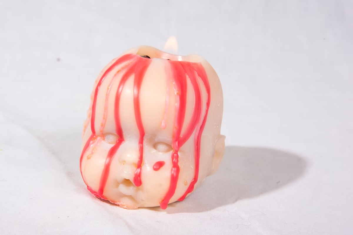 Baby Kopf Kerze als lustige Idee für Weihnachtsgeschenke