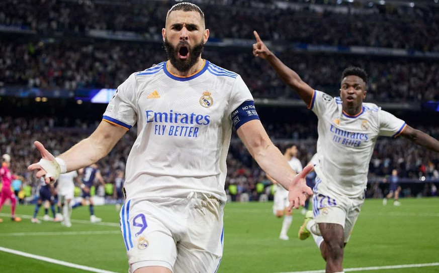 Karim Benzema und Vinicius Jr. bejubeln die unfassbare Real-Wende gegen ManCity.