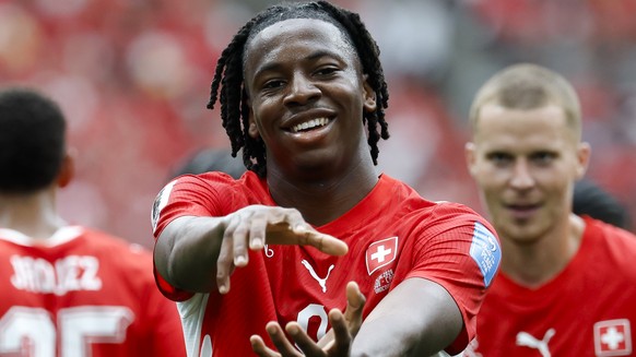 Switzerland's Johan Manzambi celebrates after scoring the second goal during the World Cup Group B soccer match between Switzerland and Canada at the BC Place stadium in Vancouver, Canada, Wednes ...