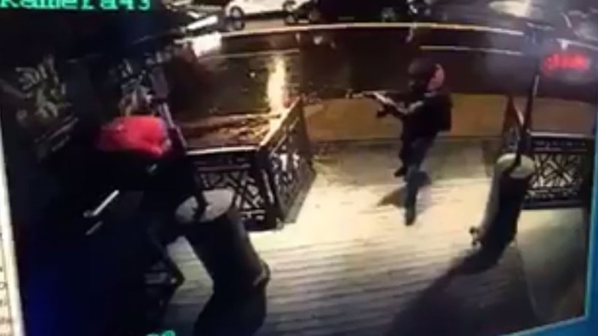 This handout video grab taken from CCTV and released on January 2, 2017 by Haber Turk Gazete newspaper shows an gunman carrying out an attack on the Reina nightclub, on the bank of the Bosphorus, in I ...