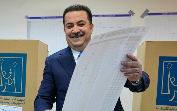 Iraqi Prime Minister Mohammed Shia al-Sudani casts his vote in the country&#039;s parliamentary election in Baghdad, Iraq, Tuesday, Nov. 11, 2025. (AP Photo/Hadi Mizban)
Iraq Election