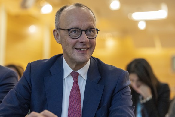 ARCHIV - 14.12.2024, Nordrhein-Westfalen, Essen: Unions-Kanzlerkandidat Friedrich Merz (CDU), l�chelt bei der Landesvertreterversammlung der CDU Nordrhein-Westfalen nach seiner Wahl zum Spitzenkandida ...
