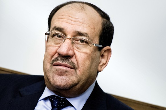 FILE - In this Monday, June 23, 2014 file photo, Iraqi Prime Minister Nouri al-Maliki meets with U.S. Secretary of State John Kerry in Baghdad. Iraq&#039;s Shiite prime minister on Wednesday, June 25, ...